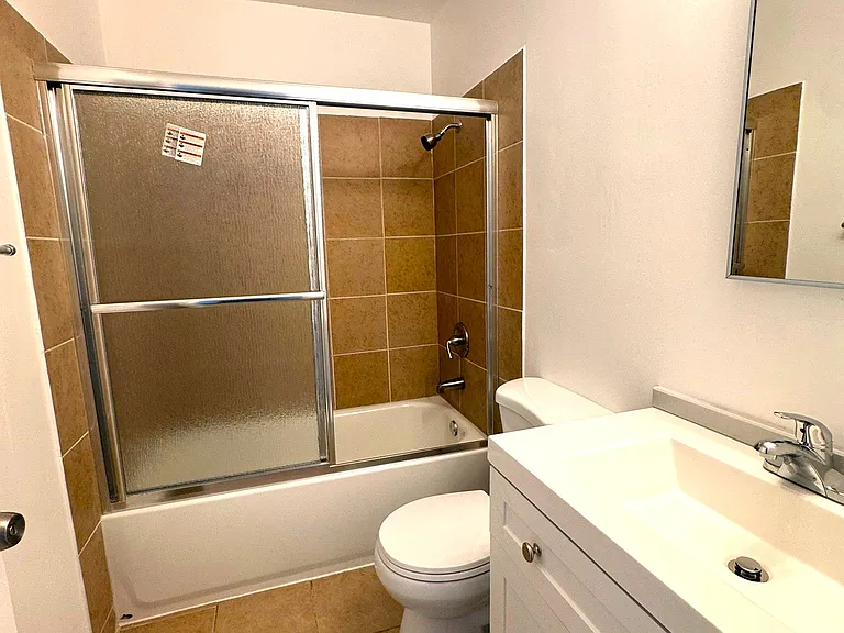 302 Dumont Ave — Photo 11