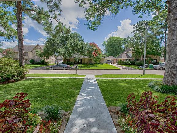 A view from the front porch of this beautifully maintained yard.