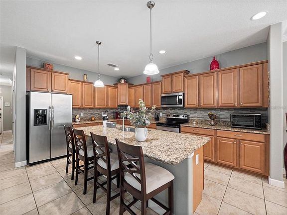 3rd image of 8876 Candy Palm Rd