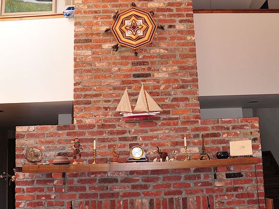 Soaring Fireplace in Vaulted Liv Rm w/ Balcony & Skylight