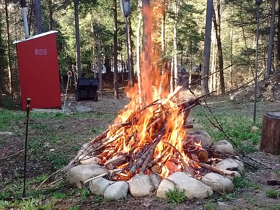 Camp fire view toward water
