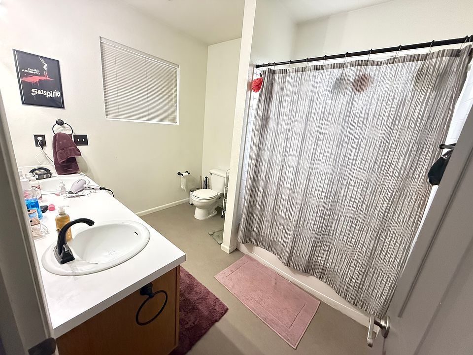 Shared bathroom. Currently working on some more shelf space above the toilet for storage. __