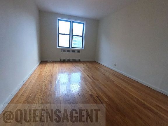 5th image of 66-20 Wetherole St #1750