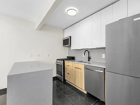 5th image of 148 E Broadway #4
