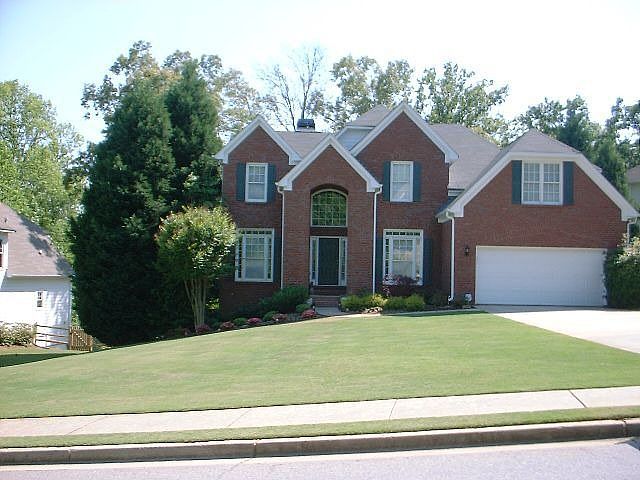 Beautiful Brick Front Traditional on Golf Course Lot