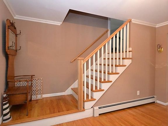 Foyer stairs to bonus room