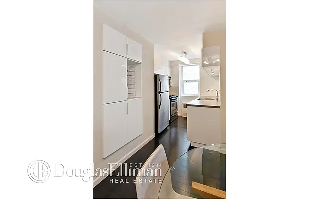 Sold by Douglas Elliman | media 13