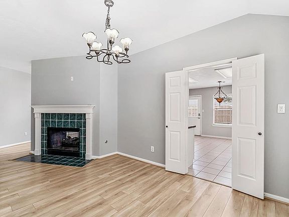 Large dining area with full view of double sided fireplace-Imagine the entertainment opportunities with combined living area and in close proximity to kitchen?