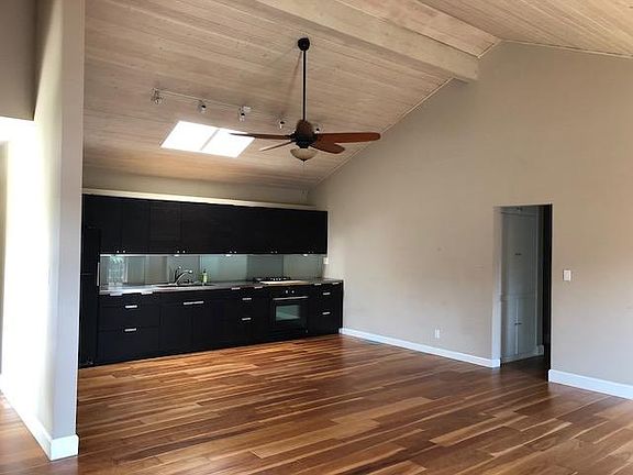 Kitchen/dining area with skylight
