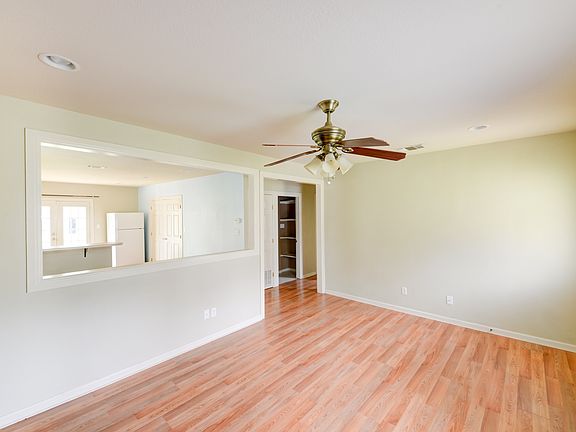 Entryway Living Room View to Dining and Kitchen