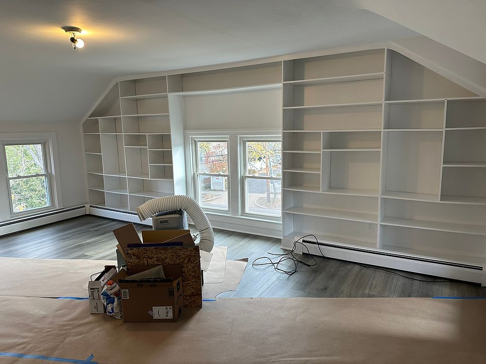 Built in shelves with room for desk and office nook.