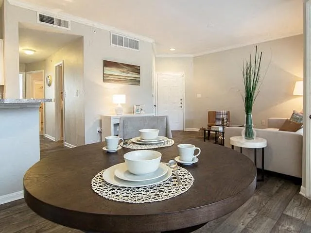 Open concept dining room with living room access