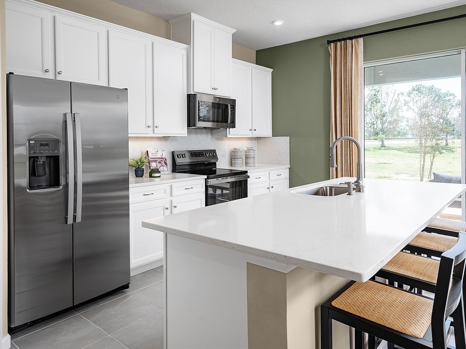 Low-maintenance townhomes in Davenport with resort-style amenities and an unbeatable location.