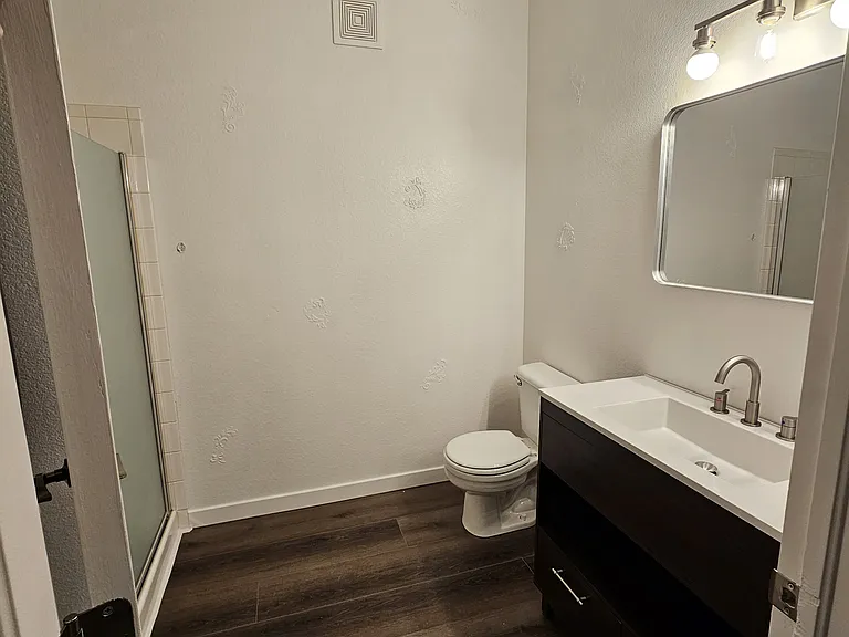 Second bathroom with shower and washer/dryer