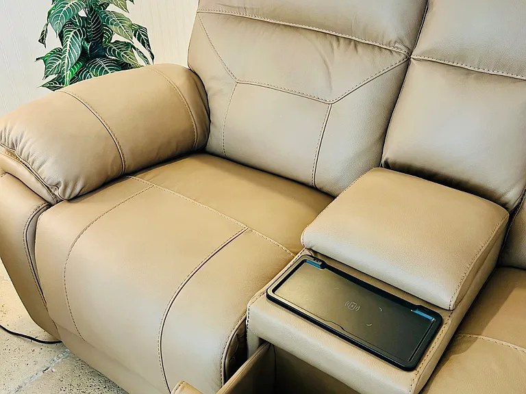 Smart couches have a charging pad and also charging ports built in.