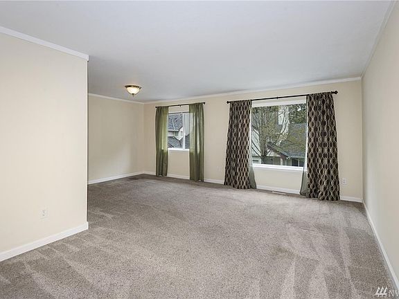 2nd image of 12957 Granite Ln NW Unit 102