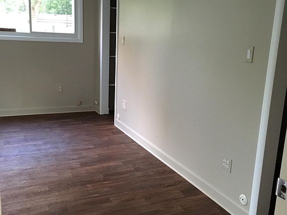Master bedroom has a door wall for great lighting and flesh summer air. Jack and Jill closets. Ceiling fan
