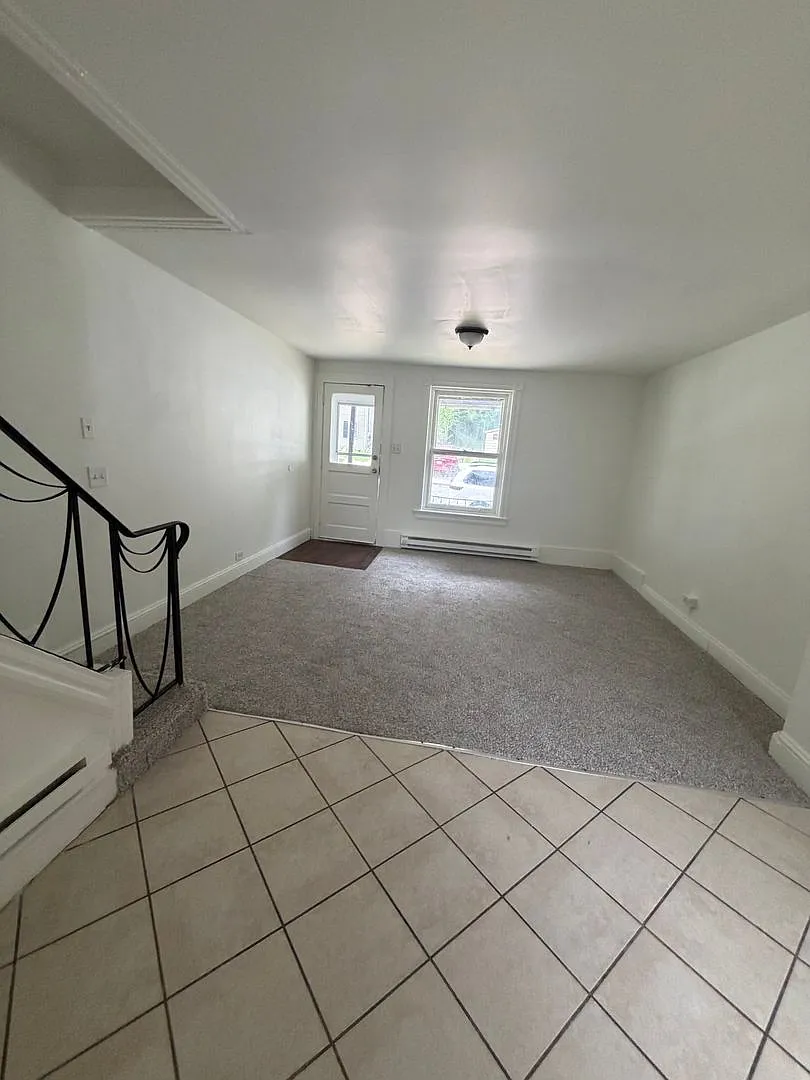 Renovated 4-Bedroom Home with Private Backyard Section 8 Applicants Accepted — Photo 1