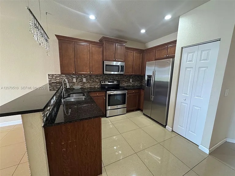 8715 NW 98th Ave #8715 — Photo 3