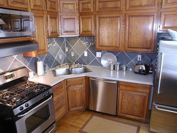 Kitchen w/ new slate tiles and top of the line GE stainless appliances