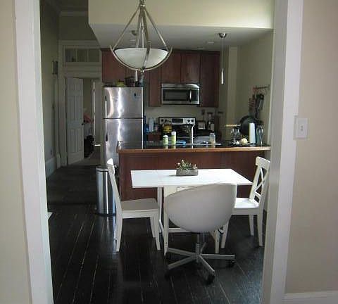 Dining room/Kitchen- wood floors all stainless appliances