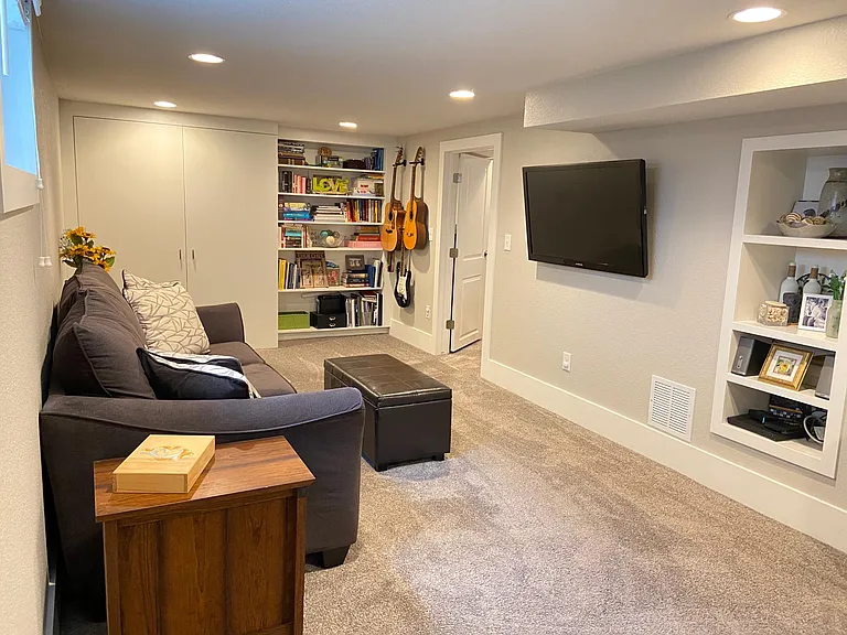 Downstairs living room with built-in desk