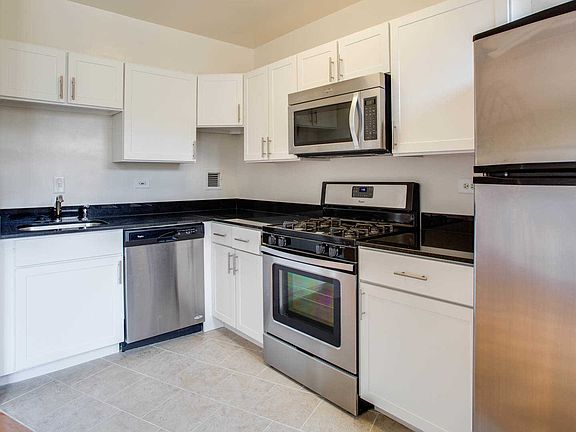 Kitchen with Stainless Steel Appliances and Granite Countertops