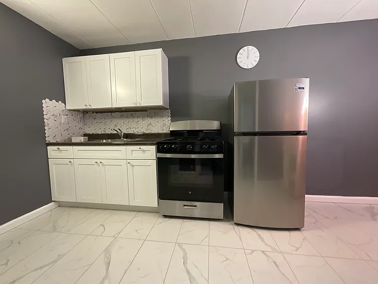 107-15 154th St #BASEMENT — Photo 1