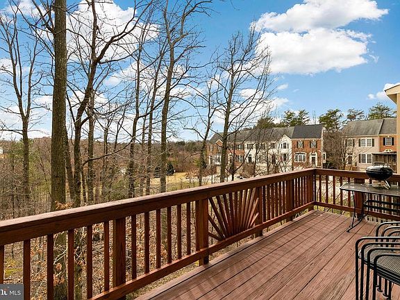 deck overlooking trees and path to metro station