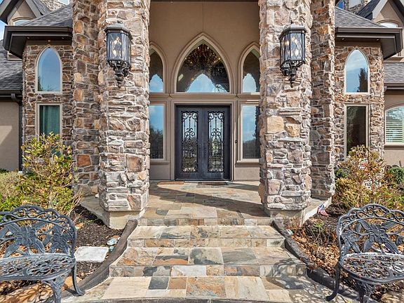 This is the entry you have been waiting for. â¢ Custom Iron and Glass Entrance Door is so inviting you will probably just stand there for a while and look around; I know that is what I did the first time arrived.