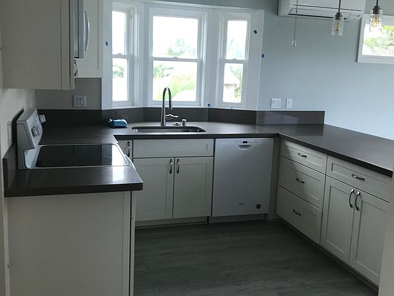 Large kitchen with dishwasher.