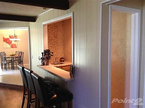 Wet bar directly off of the living room.