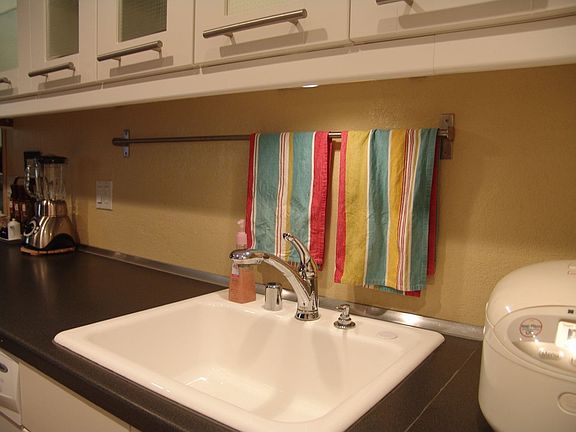 Beatiful Kohler sink with light from under the cabinet!