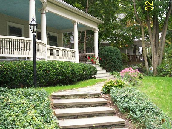 walkway leading from 3-car parking area