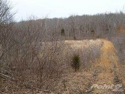 Pond dam with trail.