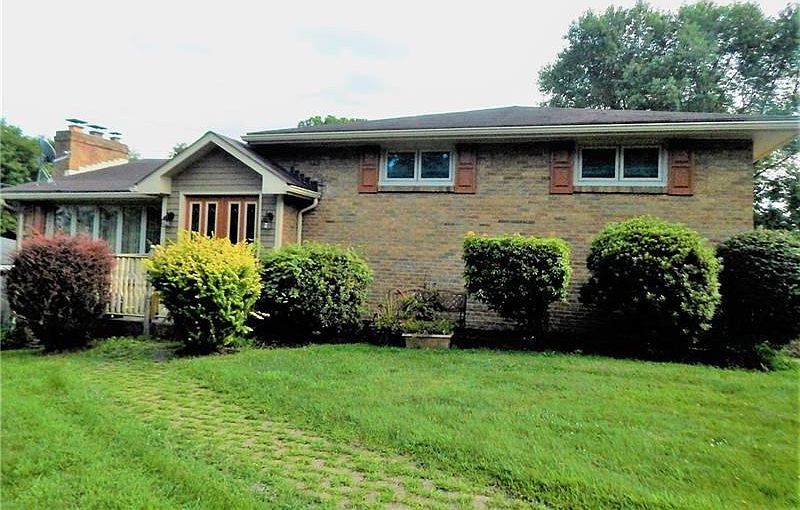THREE BEDROOM BRICK MULTI WITH TWO CAR GARAGE.