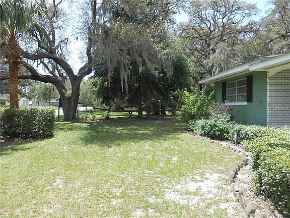 FRONT YARD OF HOUSE FACING PARK