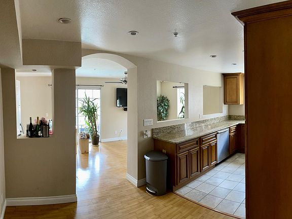 Hallway across from washer/dryer (with natural light)
