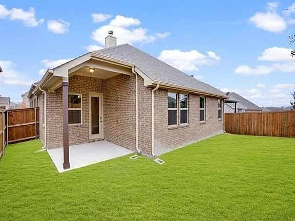 Backyard with covered patio