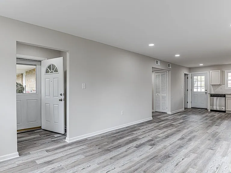 Living room with entrance on the left view
