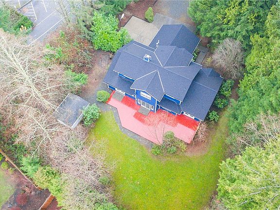 Lovely backyard lawn, spacious deck area, patio area, potting shed/storage, and garden areas