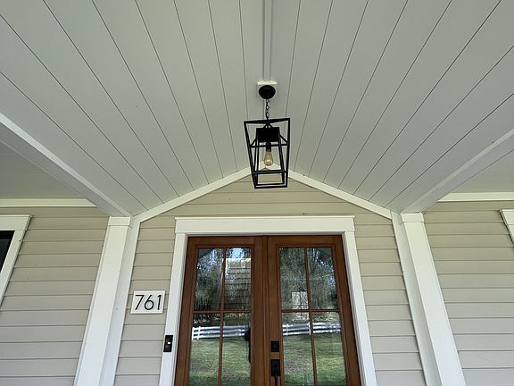 Front door, covered porch