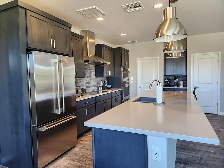 Huge kitchen island and pendant lights