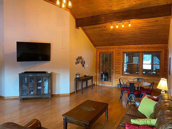 Living room with SmartTV and game table