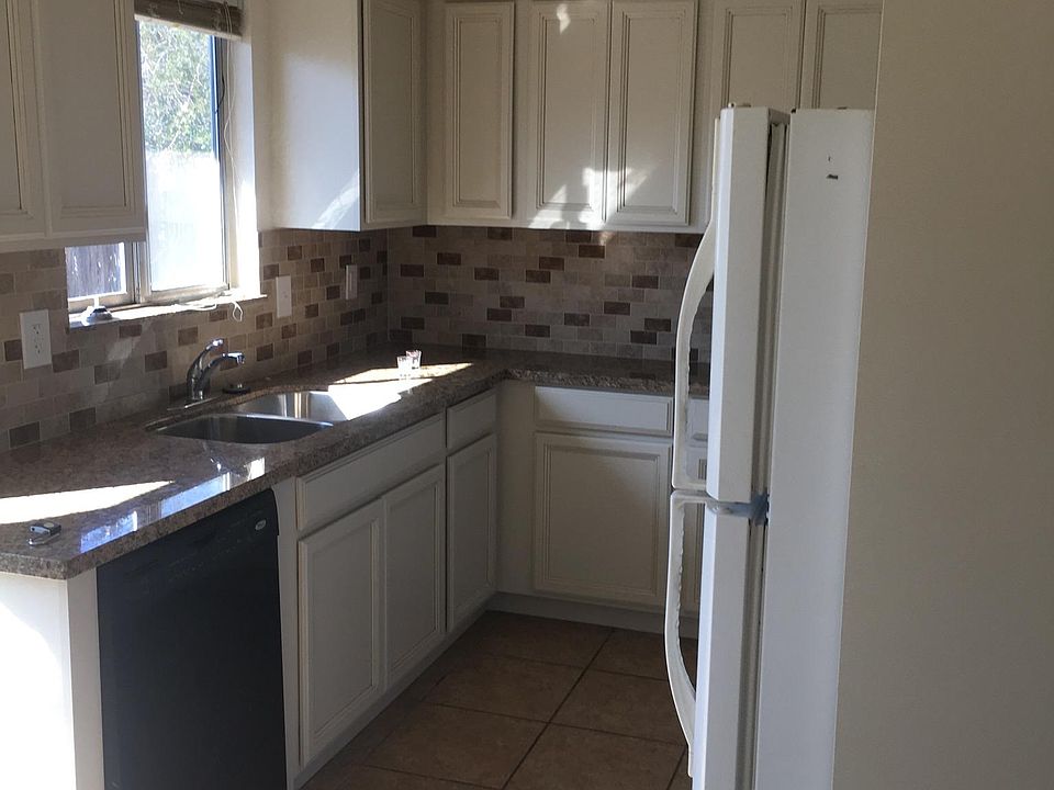 Kitchen with granite countertops and nice newer cabinets