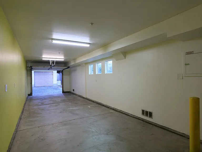 Inside View of Garage Looking Out Towards Central Motorcourt