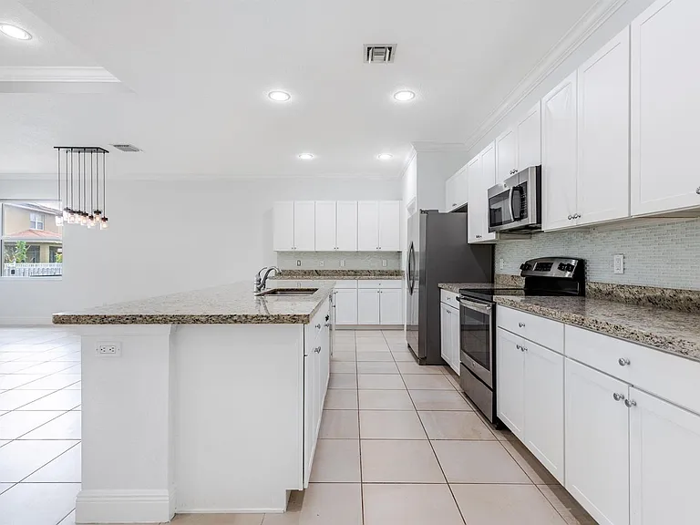 1367 NW Leonardo Cir — Photo 18