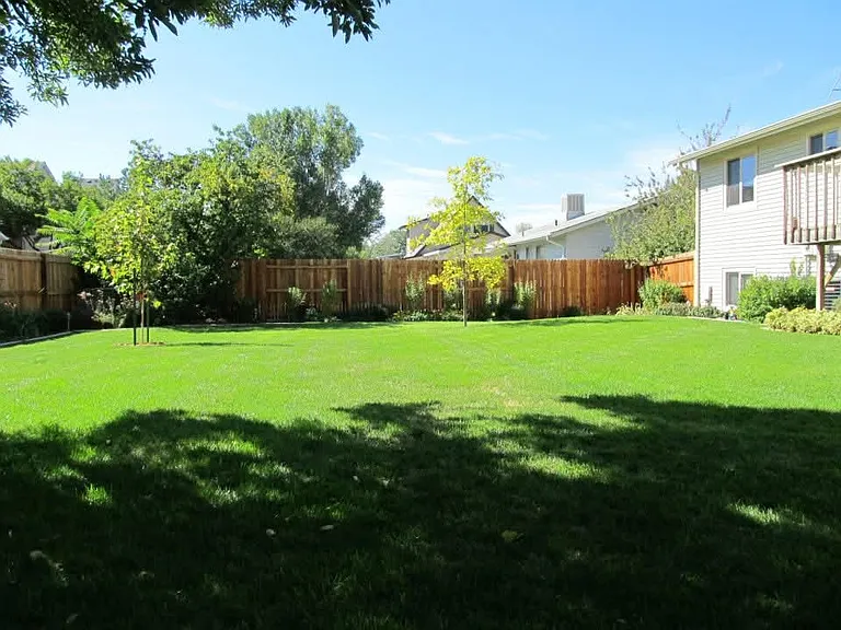 South facing back yard with sprinkler system and 6' privacy fence enclosed