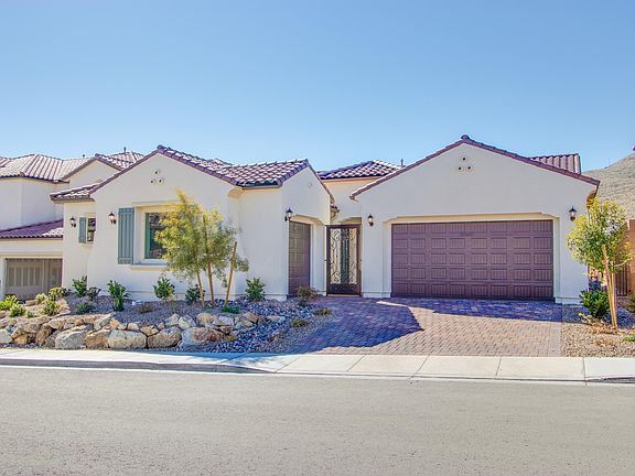 Front view of the house with 3 car garage