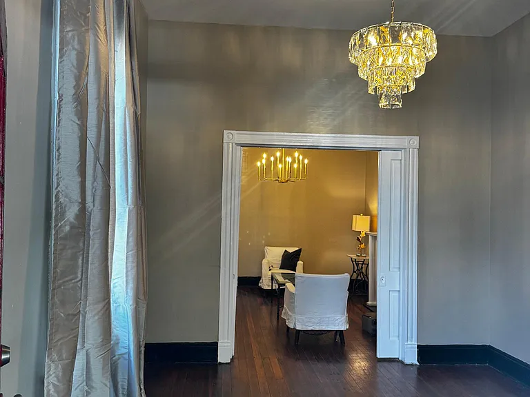 Parlor and Dining Room With French Doors